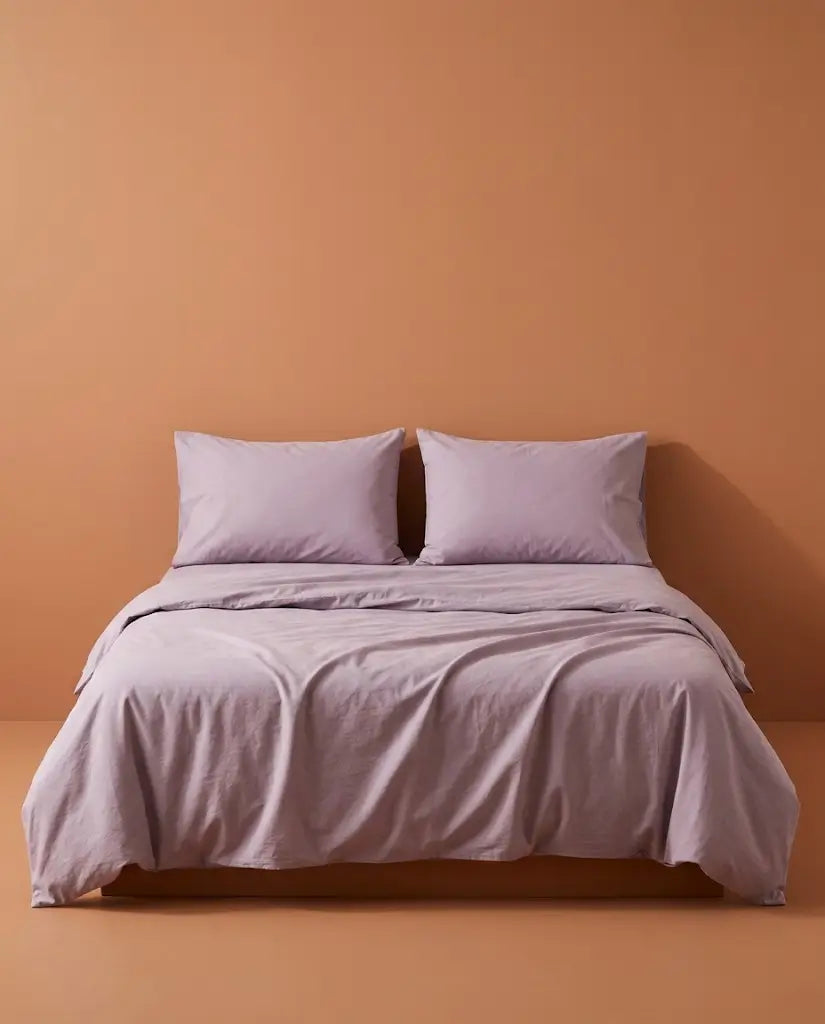 Taies d'oreiller percale de coton Lilas – sur le lit