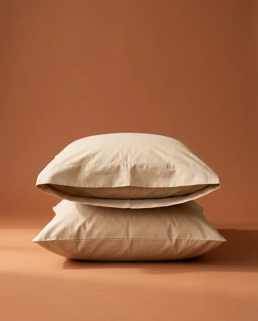 Taies d'oreiller percale de coton Nude – taies empilées