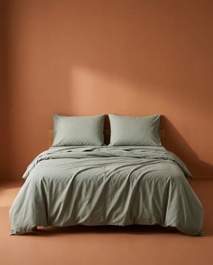 Taies d'oreiller percale de coton Argile – sur le lit