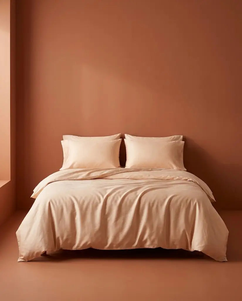 Taies d'oreiller satin de coton Dune – sur le lit